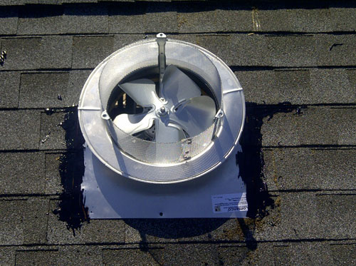 Fan on the roof of a house