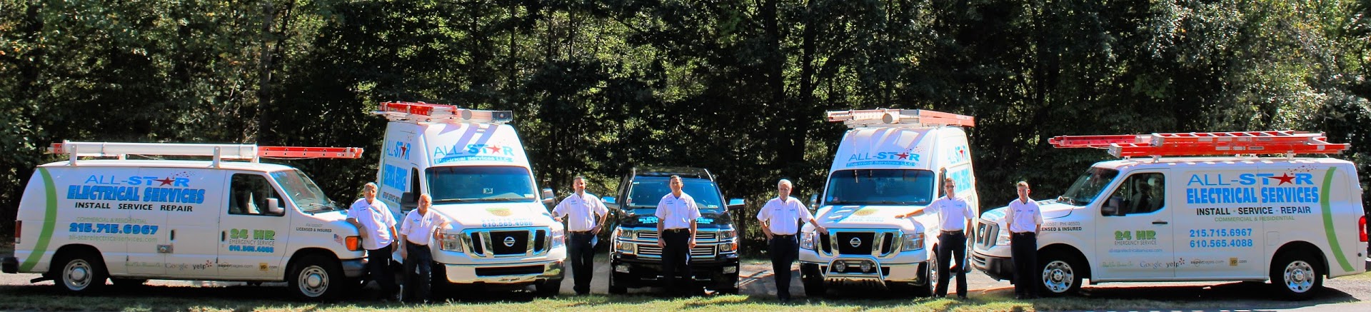The men from All Star Electrical Services, LLC posing with their fleet of vans